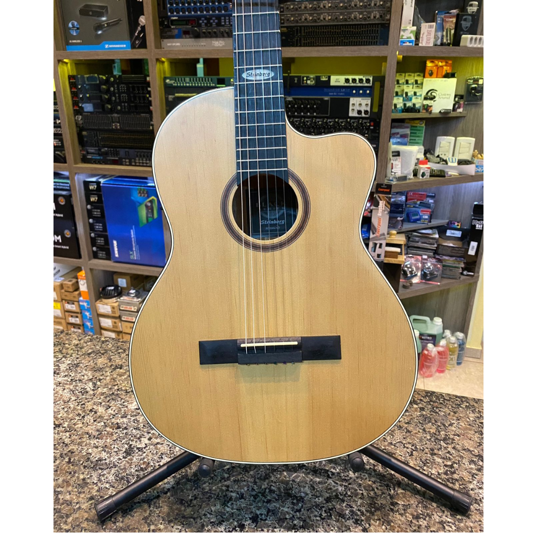 Foto do produto Violão Nylon Elétrico Strinberg Com Cutway Sc200c Natural (USADO) Foto do produto Violão Nylon Elétrico Strinberg Com Cutway Sc200c Natural (USADO)